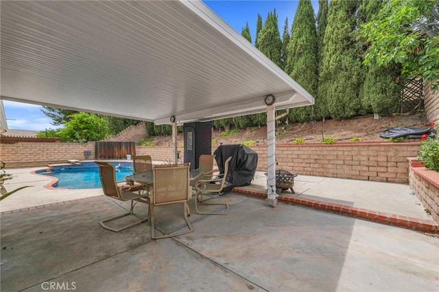 13329 Mission Tierra Way, Granada Hills, CA 91344 - fenced backyard with grilling area, a patio, and outdoor dining area