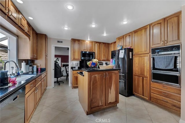13329 Mission Tierra Way, Granada Hills, CA 91344 - kitchen featuring black appliances, a warming drawer, dark countertops, a center island, and recessed lighting