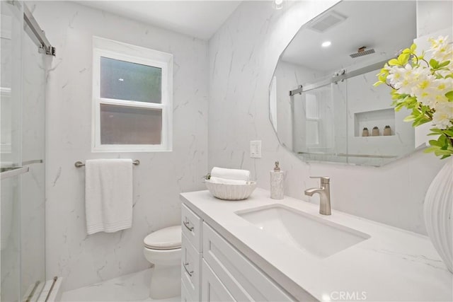 2961 Rounsevel, Laguna Beach, CA 92651 - bathroom featuring a marble finish shower, vanity, and marble finish flooring