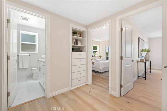 2961 Rounsevel, Laguna Beach, CA 92651 - hallway featuring light wood-style flooring and baseboards