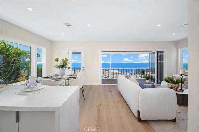 2961 Rounsevel, Laguna Beach, CA 92651 - living room featuring light wood-style flooring, healthy amount of natural light, and recessed lighting
