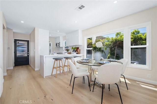 2961 Rounsevel, Laguna Beach, CA 92651 - dining room featuring light wood-type flooring and recessed lighting