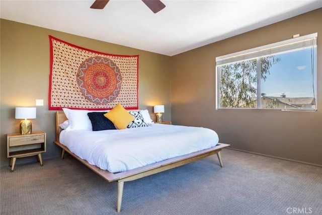 8075 Quail Trl, Yucca Valley, CA 92284 - carpeted bedroom featuring ceiling fan and baseboards