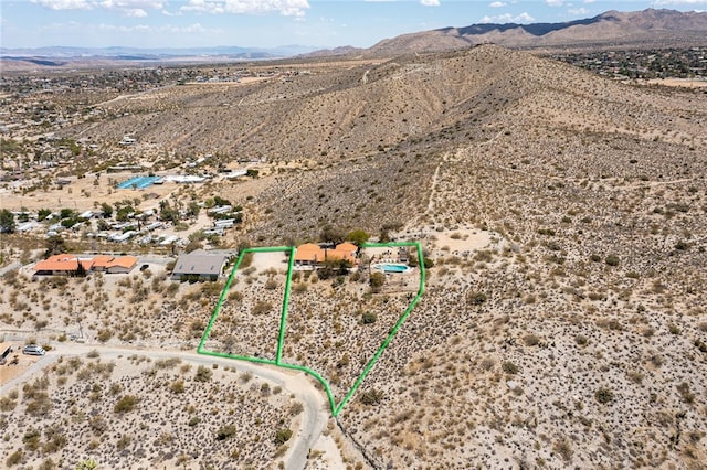 8075 Quail Trl, Yucca Valley, CA 92284 - view of rural area with a mountainous background and property parcel outlined