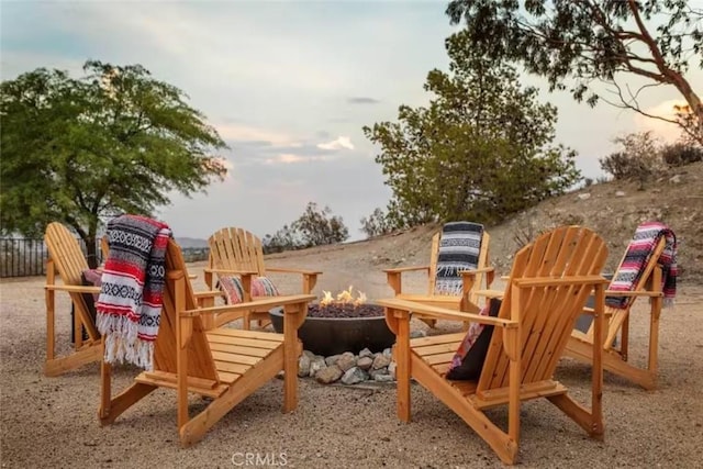 8075 Quail Trl, Yucca Valley, CA 92284 - view of jungle gym with a fire pit