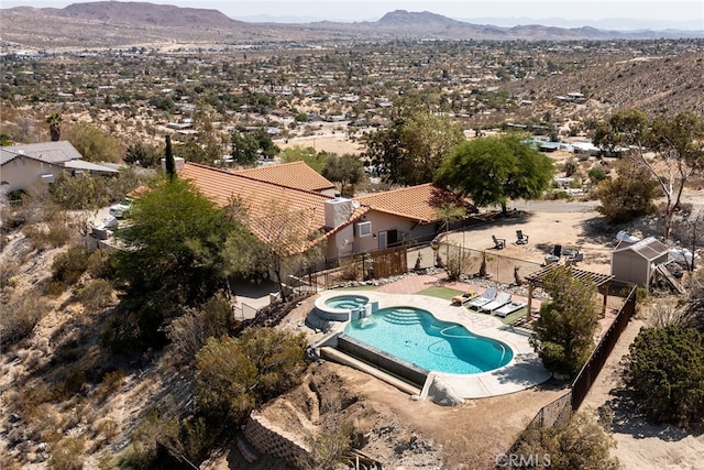 8075 Quail Trl, Yucca Valley, CA 92284 - view of swimming pool featuring a mountain view, a pool with connected hot tub, and a patio