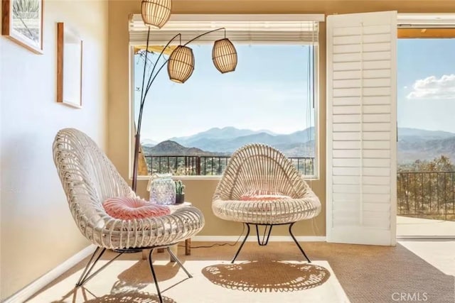 8075 Quail Trl, Yucca Valley, CA 92284 - sitting room with a mountain view and carpet flooring
