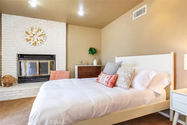 8075 Quail Trl, Yucca Valley, CA 92284 - carpeted bedroom featuring a fireplace
