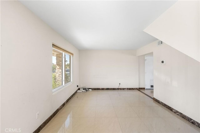 37338 Salem Ct, Palmdale, CA 93550 - empty room with baseboards and inlaid floor details
