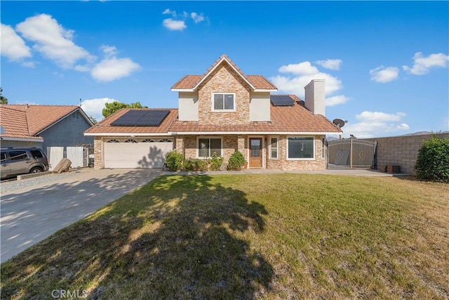 37338 Salem Ct, Palmdale, CA 93550 - traditional-style home with roof mounted solar panels, concrete driveway, a tile roof, an attached garage, and a chimney