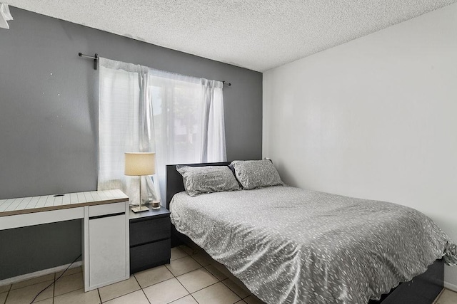 2521 W Sunflower Ave Unit R1, Santa Ana, CA 92704 - bedroom featuring light tile patterned floors and a textured ceiling