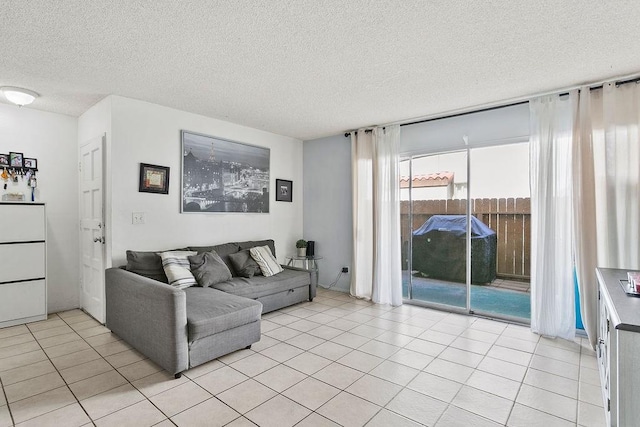 2521 W Sunflower Ave Unit R1, Santa Ana, CA 92704 - living area with a textured ceiling and light tile patterned floors
