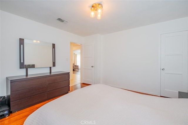 10404 Jardine Ave, Sunland, CA 91040 - bedroom with light wood-style flooring