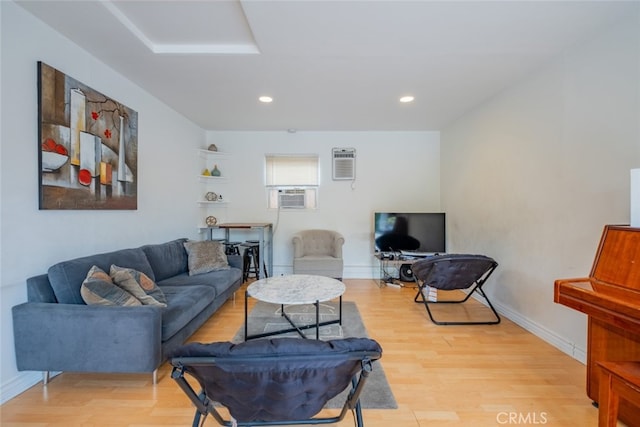 10404 Jardine Ave, Sunland, CA 91040 - living room featuring light wood finished floors, an AC wall unit, recessed lighting, and cooling unit