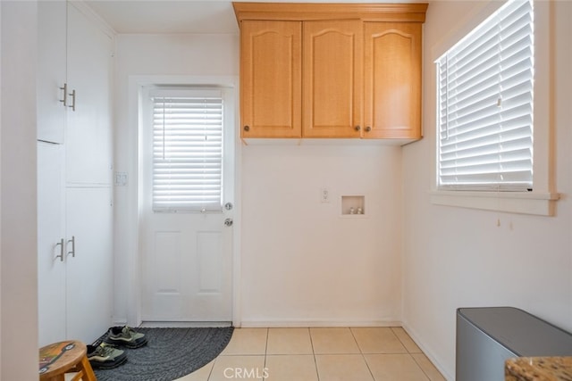 10404 Jardine Ave, Sunland, CA 91040 - laundry room featuring light tile patterned flooring and washer hookup