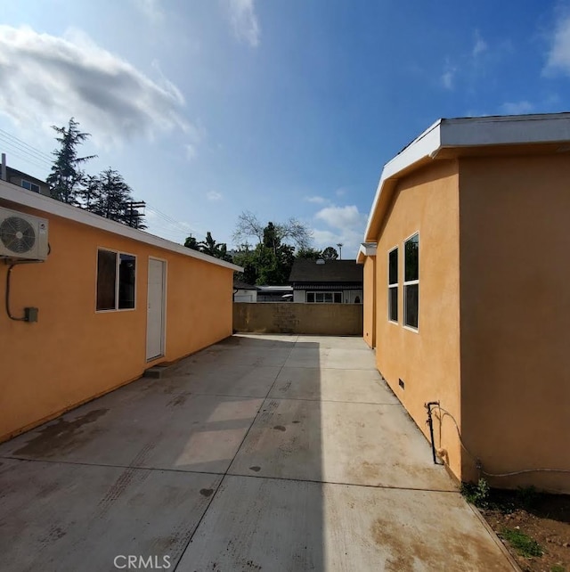 3765 Globe Ave, Los Angeles, CA 90066 - view of side of property featuring stucco siding and a patio area