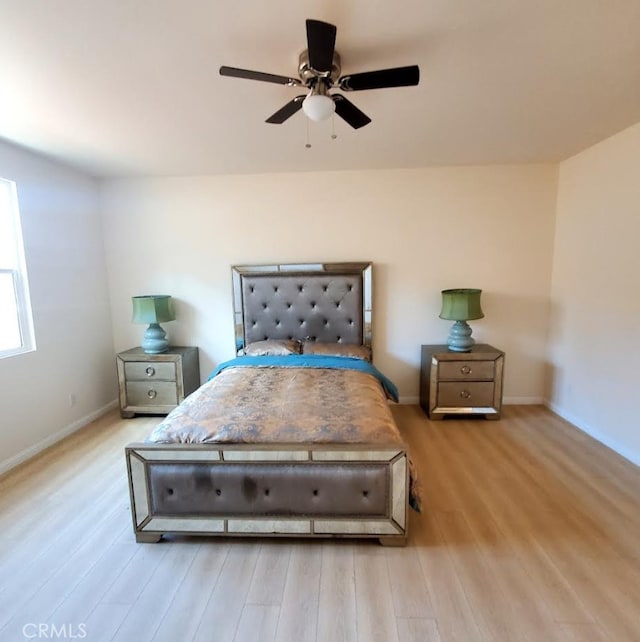 3765 Globe Ave, Los Angeles, CA 90066 - bedroom with wood finished floors and ceiling fan