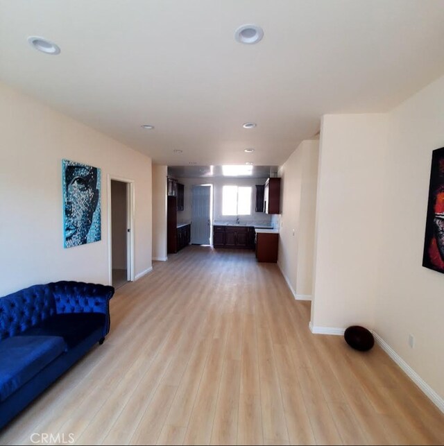 3765 Globe Ave, Los Angeles, CA 90066 - unfurnished living room with light wood finished floors and recessed lighting