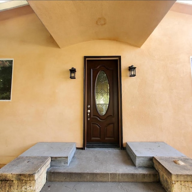3765 Globe Ave, Los Angeles, CA 90066 - doorway to property featuring stucco siding