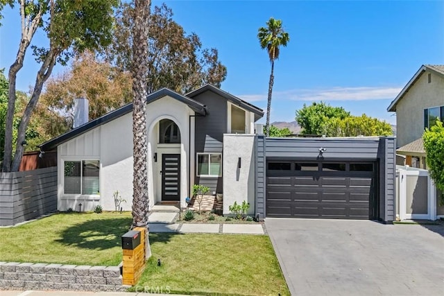 32772 Shipside Dr, Dana Point, CA 92629 - mid-century modern home with concrete driveway, stucco siding, and an attached garage