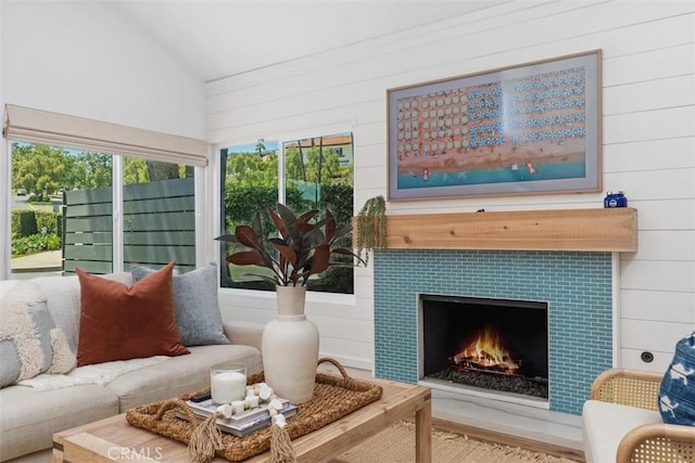 32772 Shipside Dr, Dana Point, CA 92629 - living area featuring wood walls, a tiled fireplace, and wood finished floors