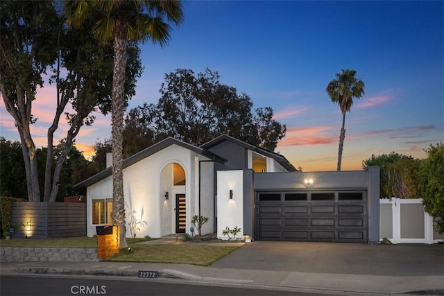32772 Shipside Dr, Dana Point, CA 92629 - view of front of home with concrete driveway, a garage, and stucco siding