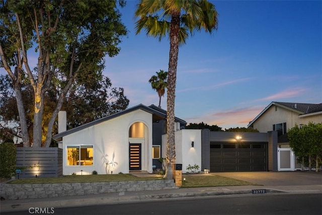 32772 Shipside Dr, Dana Point, CA 92629 - contemporary house with a garage, stucco siding, and concrete driveway