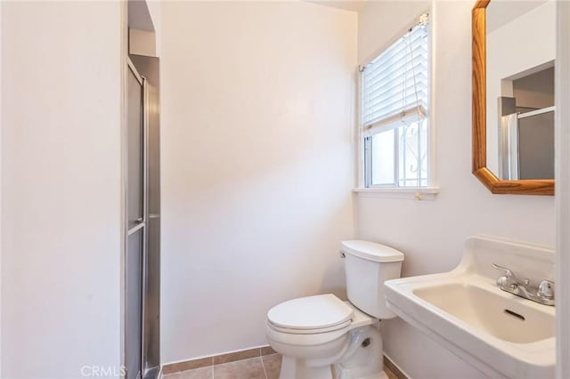 1908 W 134th Pl, Gardena, CA 90249 - full bath featuring a shower stall and tile patterned flooring