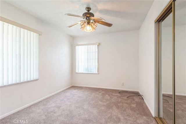 1908 W 134th Pl, Gardena, CA 90249 - unfurnished bedroom featuring a closet, carpet flooring, and a ceiling fan