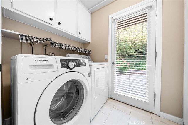 20158 Barnard Ave, Walnut, CA 91789 - washroom with cabinet space, washing machine and clothes dryer, and light tile patterned flooring