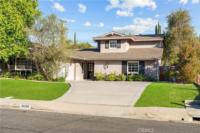20158 Barnard Ave, Walnut, CA 91789 - traditional-style home featuring driveway, a front yard, and a garage