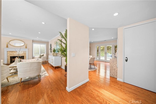 20158 Barnard Ave, Walnut, CA 91789 - foyer entrance featuring light wood-type flooring, healthy amount of natural light, a premium fireplace, ornamental molding, and recessed lighting