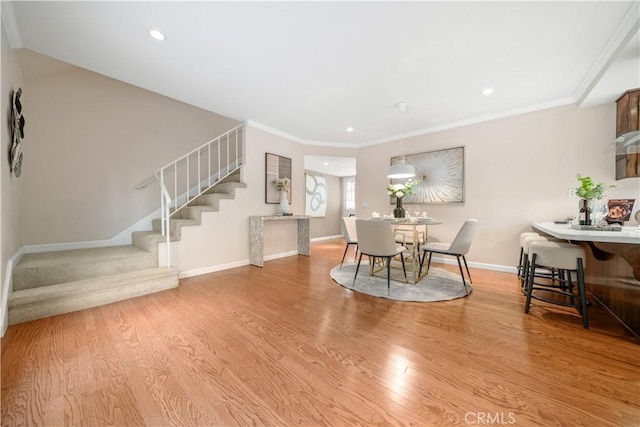 20158 Barnard Ave, Walnut, CA 91789 - dining room with stairway, wood finished floors, recessed lighting, and crown molding