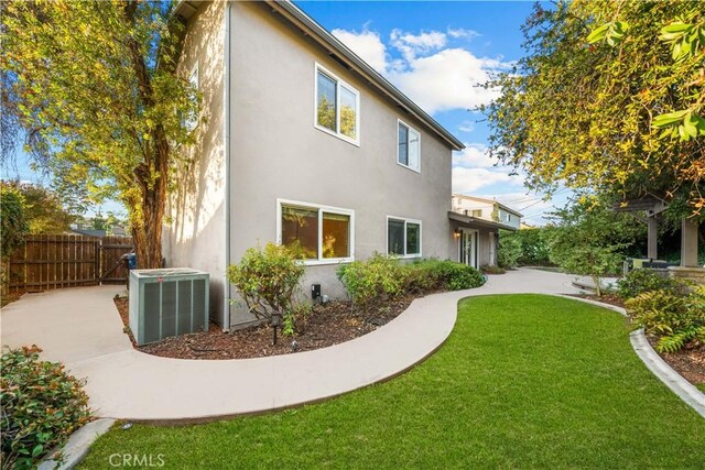 20158 Barnard Ave, Walnut, CA 91789 - rear view of house with stucco siding and a patio area