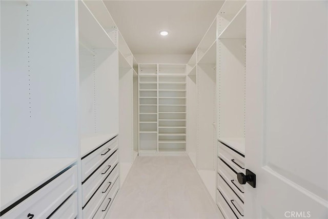 28524 Songbird Way, Saugus, CA 91350 - walk in closet with light tile patterned flooring