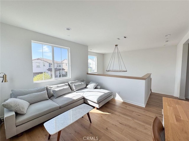 28524 Songbird Way, Saugus, CA 91350 - living area with light wood-type flooring and baseboards