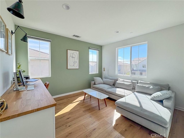 28524 Songbird Way, Saugus, CA 91350 - living room featuring light wood-style floors and recessed lighting