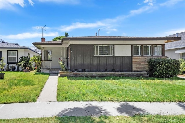 2729 N Studebaker Rd, Long Beach, CA 90815 - bungalow with a front yard and stucco siding