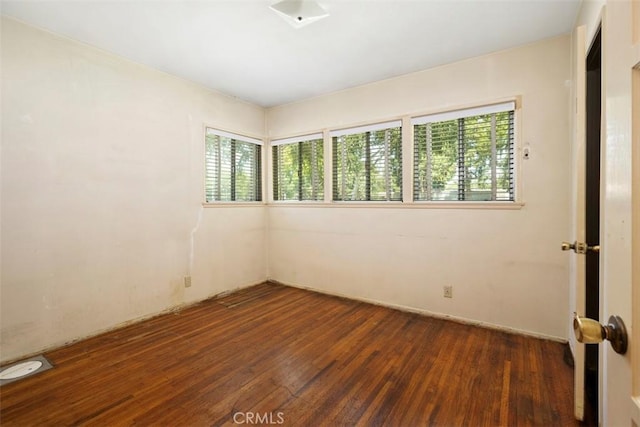 2729 N Studebaker Rd, Long Beach, CA 90815 - unfurnished room with wood finished floors