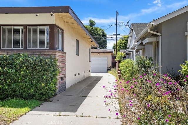 2729 N Studebaker Rd, Long Beach, CA 90815 - view of property exterior featuring stucco siding and an outdoor structure