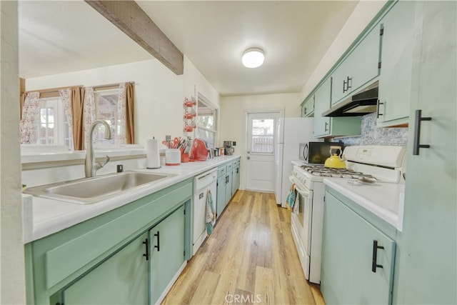 77 Meadow Lakes Dr, Tehachapi, CA 93561 - kitchen featuring white appliances, green cabinets, and under cabinet range hood