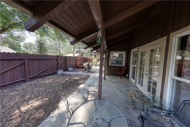 77 Meadow Lakes Dr, Tehachapi, CA 93561 - fenced backyard featuring french doors, a patio area, and outdoor dining space