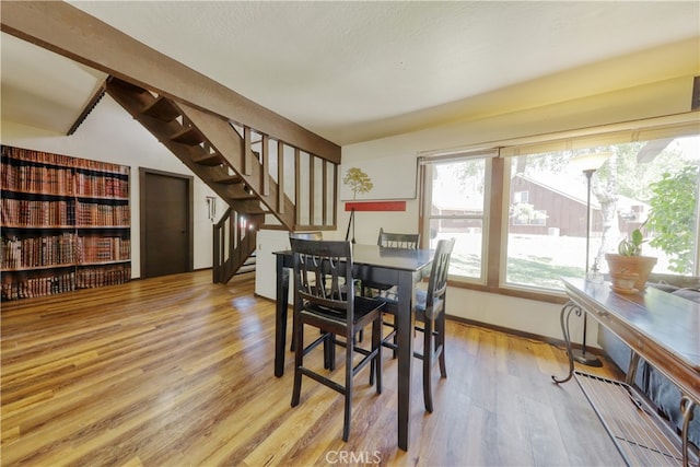77 Meadow Lakes Dr, Tehachapi, CA 93561 - dining space featuring wood finished floors and stairs