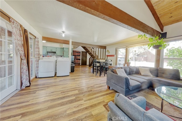 77 Meadow Lakes Dr, Tehachapi, CA 93561 - living room with independent washer and dryer, plenty of natural light, light wood-type flooring, vaulted ceiling, and stairs