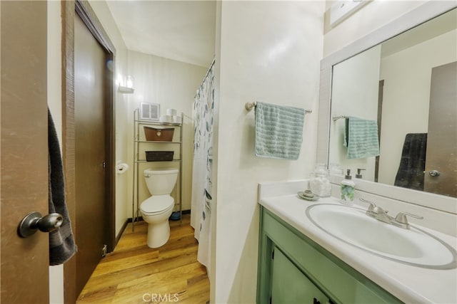 77 Meadow Lakes Dr, Tehachapi, CA 93561 - bathroom featuring wood finished floors and vanity