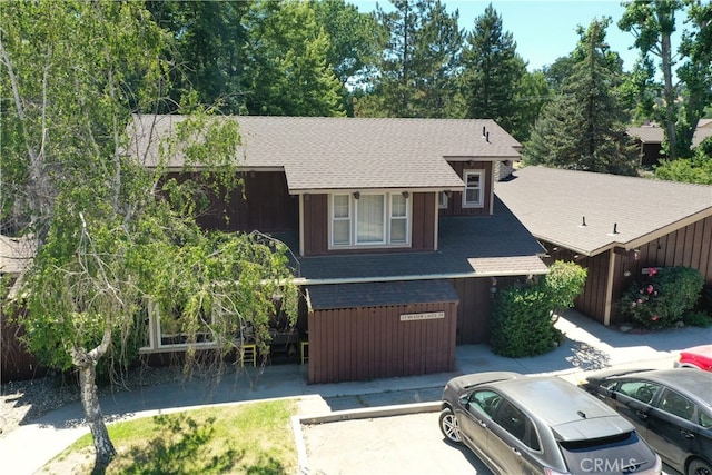 77 Meadow Lakes Dr, Tehachapi, CA 93561 - view of front facade featuring a shingled roof and uncovered parking