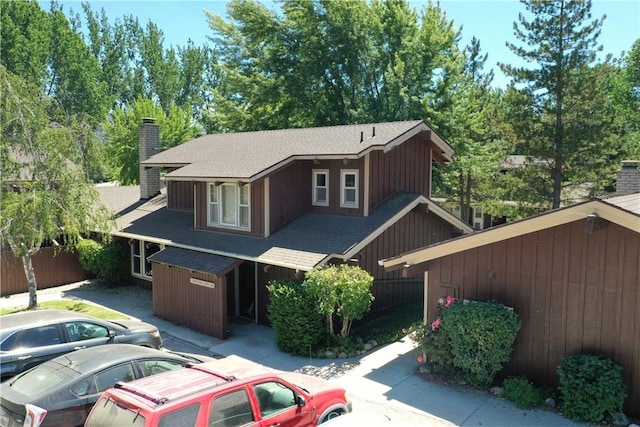77 Meadow Lakes Dr, Tehachapi, CA 93561 - view of front of home featuring roof with shingles and a chimney