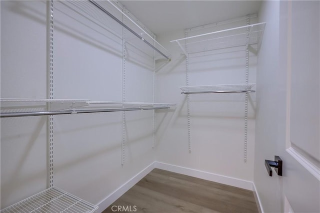 14632 Kimberly Cir, Tustin, CA 92780 - spacious closet with wood finished floors