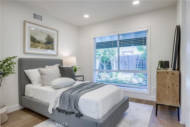 14632 Kimberly Cir, Tustin, CA 92780 - bedroom featuring wood finished floors and recessed lighting