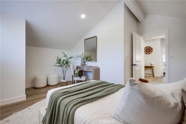 14632 Kimberly Cir, Tustin, CA 92780 - bedroom featuring lofted ceiling, wood finished floors, and recessed lighting